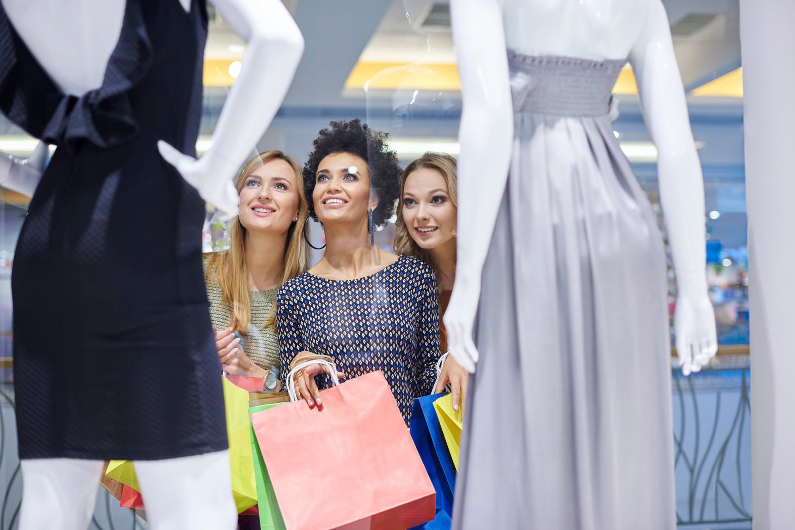 Elegant designer dress displayed on mannequin with classic silhouette